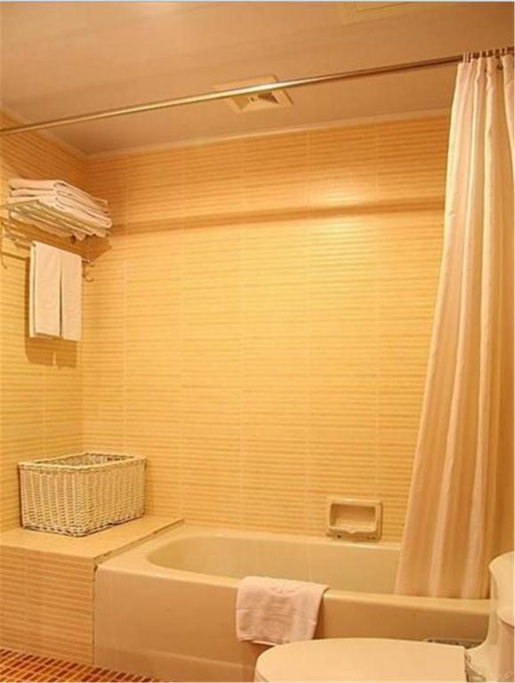 Donghai Grand Hotel Циндао Стая снимка